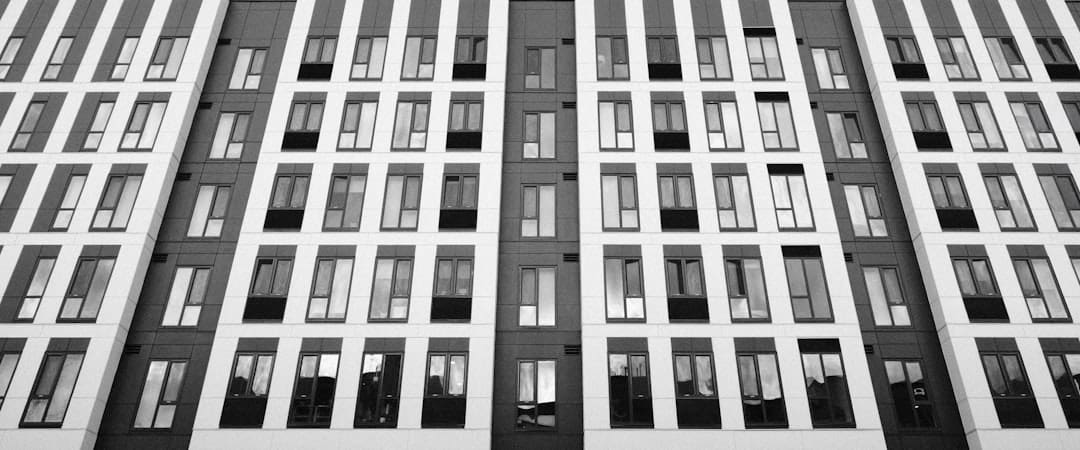 Fair Housing Act. Modern high-rise building facade.