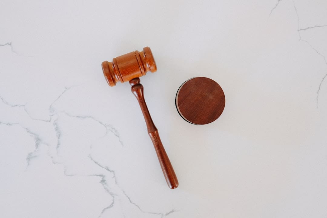 FHA and ADA conflict — wooden gavel and block on marble