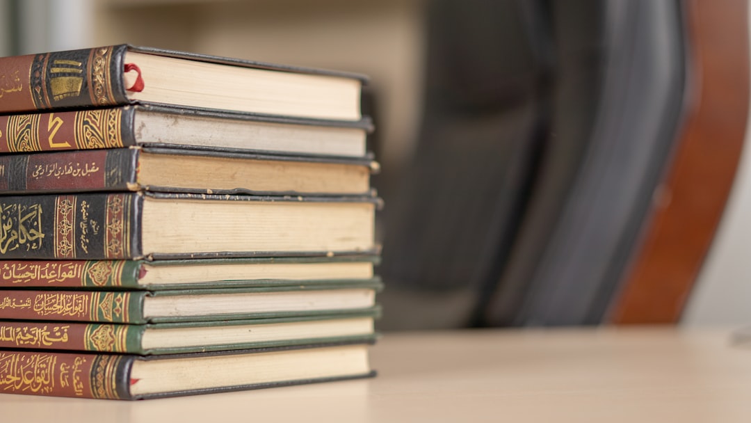 BSL service dogs — a stack of books sitting on top of a table
